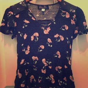 Black floral peplum top.